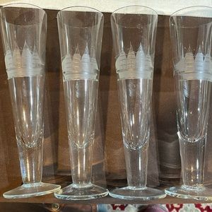 Vintage tall glasses with schooner etched design